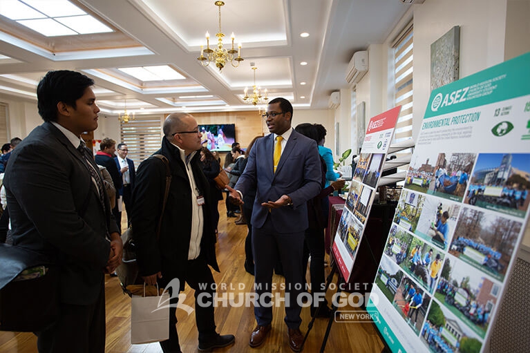 New members and guests learning about the activities and achievements of the Church of God.